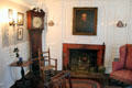 Parlor with tall clock & fireplace at Home Sweet Home Museum. East Hampton, NY.