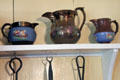 Copper lusterware pitchers at Home Sweet Home Museum. East Hampton, NY.