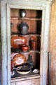 Built in cupboard with American redware pottery at Thomas Halsey Homestead. South Hampton, NY.
