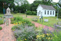 Long Island Museum fountain & schoolhouse moved to site. Stony Brook, NY.