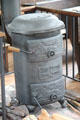 Schoolhouse cast iron stove by Lake Region Stone Works Inc. at Long Island Museum. Stony Brook, NY.