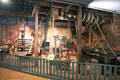 Wagon manufacturing machine shop driven by leather belts at carriage collection of Long Island Museum. Stony Brook, NY.