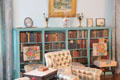 Books shelves & embroidered chairs in Edith's drawing room at Roosevelt's House Sagamore Hill NHS. Cove Neck, NY.