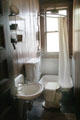 Bathroom with shower stall at Roosevelt's House Sagamore Hill NHS. Cove Neck, NY.