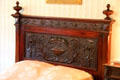 Headboard of Edith's bed in south bedroom at Roosevelt's House Sagamore Hill NHS. Cove Neck, NY.