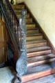 Stairway with carved newel post at Vanderbilt Mansion. Centerport, NY.