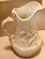Stoneware white pitcher with iris from Frederick Dallas Hamilton Road Pottery at Cincinnati Art Museum. Cincinnati, OH.