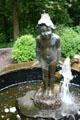 Fountain statue of nymph with leaf hat in Wildwood Manor House gardens. Toledo, OH.
