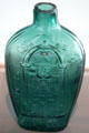 Mold blown glass flask with Masonic symbols from Zanesville, OH at Toledo Glass Pavilion. Toledo, OH.