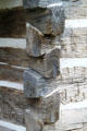 Detail of corner notched logs for Annie Brown Log Home at Historic Lyme Village Museum. Bellevue, OH.