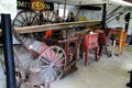 Various wagons & implements in blacksmith shop at Milan Historical Museum. Milan, OH.