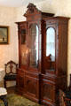 China cabinet in parlor of Sayles House at Milan Historical Museum. Milan, OH.