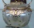 Iridescent Johann Loetz sweetmeat jar with bats at Milan Historical Museum. Milan, OH.