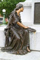 Mourning figure in bronze at base of William Harvey Gibson Monument. Tiffin, OH.