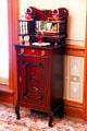 Side cabinet with ruby glassware at Ida Saxton McKinley Historic House. Canton, OH.