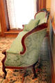 Green damask settee in parlor at Ida Saxton McKinley Historic House. Canton, OH.