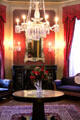 French crystal chandelier, wall sconces & Venetian mirror at Hower House. Akron, OH.