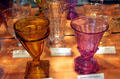 Goblets in various colors at National Heisey Glass Museum. Newark, OH.