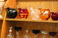 Row of round flasks at National Museum of Cambridge Glass. Cambridge, OH.