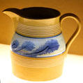Yellow ware pitcher with blue seaweed decoration attrib. to McNicol & Burton at Museum of Ceramics. East Liverpool, OH.