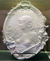 Whiteware plaque with bas relief woman by Homer Laughlin at Museum of Ceramics. East Liverpool, OH.