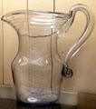 Clear blown glass pitcher attr: Zanesville at Stone Academy Museum. Zanesville, OH