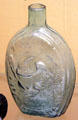 Aqua blown glass flask with American eagle by J. Shepard & Co., Zanesville at Stone Academy Museum. Zanesville, OH.