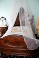 Net covered bed at Kelton House Museum. Columbus, OH.