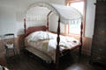 Bed with arched canopy & trundle bed at Johnston Farm. Piqua, OH.