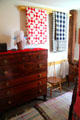 Bedroom chest of drawers with quilts in Whitney home at Historic Kirtland Village. Kirtland, OH.