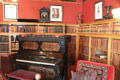 Piano & bookshelves in Garfield Presidential Library at Garfield home. Mentor, OH.
