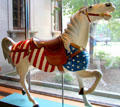 Carousel horse with flag by Philadelphia Toboggan Co. at Cleveland History Center. Cleveland, OH.