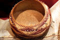 Pomo wedding basket with quail feathers from Northern California at Cleveland Museum of Natural History. Cleveland, OH.