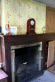 Fireplace with mantle clock in Herrick House at Hale Farm. Cleveland, OH.