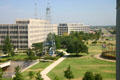 Oklahoma State Office buildings & oil well on Capitol grounds. Oklahoma City, OK.