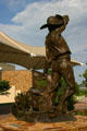 Sculpted cow puncher with saddle outside National Cowboy Museum. Oklahoma City, OK.