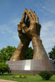 Praying Hands bronze statue at entrance to Oral Roberts University campus. Tulsa, OK.