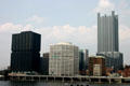 Black Westinghouse Tower, white National City Center & PPG Place over Monongahela River. Pittsburgh, PA.