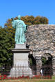 Statue of William Ellery Channing a Unitarian preacher & Old Stone Mill in Touro Park. Newport, RI.
