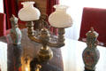 Double oil lamp & oriental jars in Mr. Vanderbilt's Bedroom at The Breakers. Newport, RI.