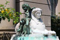Female sphinx marble sculpture with bronze putti on back at The Elms. Newport, RI.
