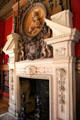 Library fireplace with Madonna & Child carving in pediment at The Elms. Newport, RI.