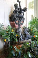 Fountain with bronze horses & sea deities in Conservatory at The Elms. Newport, RI.