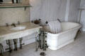 Mr. Berwind's bathroom with sink & tub at The Elms. Newport, RI.
