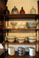 Kitchen shelving with ceramic bowls & crocks at The Elms. Newport, RI.