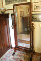 Antique cheval mirror with candle holders at Kingscote. Newport, RI.