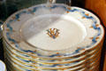 William K. Vanderbilt's crest on dinner plates at Marble House. Newport, RI.