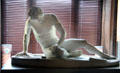 Marble sculpture of seated male nude in Marble Hall at Chateau-sur-Mer. Newport, RI.