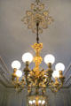 Converted gaslight chandelier in Ballroom at Chateau-sur-Mer. Newport, RI.