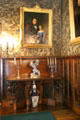 Dining room side table, portrait & Florentine decorative leather walls at Chateau-sur-Mer. Newport, RI.